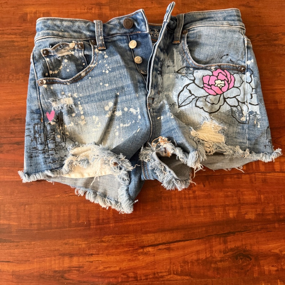 American Eagle Hi-Rise Festival Denim Shorts Sz 2 Blue Distressed Graphic